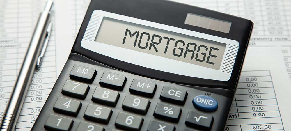 calculator showing the word mortgage